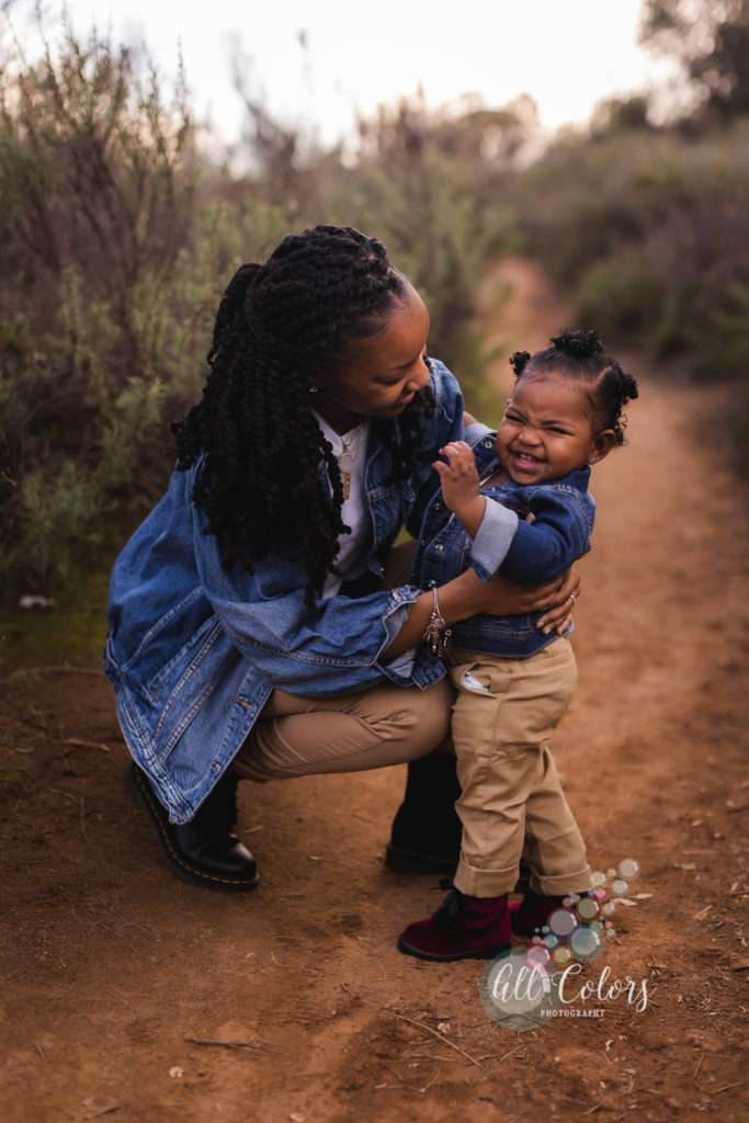 black mom and daughter on a trail in San Diego