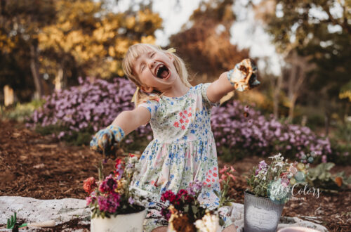 Overly excited girl gardening.